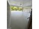 Spacious covered porch with ample room for outdoor seating, offering a relaxing outdoor area at 229 Timberland Trl, Riverdale, GA 30274