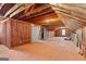 Unfinished attic space with exposed rafters, subfloor and insulation, offering great potential at 3499 S Ola Rd, Locust Grove, GA 30248