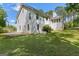 Expansive backyard featuring a well-manicured lawn and mature trees, offering a private outdoor space at 3499 S Ola Rd, Locust Grove, GA 30248