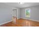 Dining Room with beautiful hardwood floors and light gray walls at 3499 S Ola Rd, Locust Grove, GA 30248