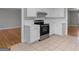 A kitchen featuring white cabinets and modern appliances at 3499 S Ola Rd, Locust Grove, GA 30248