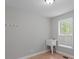 A laundry room with a utility sink and window at 3499 S Ola Rd, Locust Grove, GA 30248