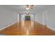 Spacious living room with a hardwood floor and stone fireplace at 3499 S Ola Rd, Locust Grove, GA 30248