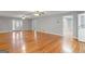 Large open living room with beautiful hardwood floors, fresh paint and an open floor plan at 3499 S Ola Rd, Locust Grove, GA 30248