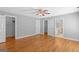 Large main bedroom with hardwood floors and en-suite bathroom access at 3499 S Ola Rd, Locust Grove, GA 30248