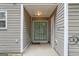 Covered back porch with access to sliding glass doors at 1823 Devon Sw Dr, Atlanta, GA 30311