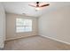 Bedroom featuring neutral paint, carpeted floors, and natural light at 1823 Devon Sw Dr, Atlanta, GA 30311