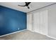 This bedroom features plush carpeting, a ceiling fan, and a neutral color scheme at 1823 Devon Sw Dr, Atlanta, GA 30311