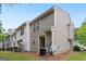 Back exterior view of property featuring tan siding at 1823 Devon Sw Dr, Atlanta, GA 30311
