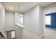 Bright hallway featuring neutral paint and carpeted floors at 1823 Devon Sw Dr, Atlanta, GA 30311