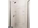 Shower with built-in shelving and chrome fixtures at 1823 Devon Sw Dr, Atlanta, GA 30311