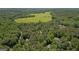 Aerial view of the property showcasing the expansive lot and surrounding landscape at 2058 Sewanee Ct, Villa Rica, GA 30180