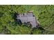 Aerial view of the home showcasing the roof and surrounding foliage at 2058 Sewanee Ct, Villa Rica, GA 30180