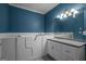 Beautiful bathroom featuring a walk-in bathtub and a large vanity at 2058 Sewanee Ct, Villa Rica, GA 30180