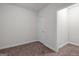 Neutral bedroom with carpet and door at 2058 Sewanee Ct, Villa Rica, GA 30180