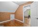 A charming bedroom features hardwood floors and leads to another room with a view at 2058 Sewanee Ct, Villa Rica, GA 30180