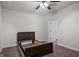 Bedroom with carpet, bed frame and open door at 2058 Sewanee Ct, Villa Rica, GA 30180
