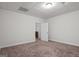 Spacious bedroom with carpet and an open doorway at 2058 Sewanee Ct, Villa Rica, GA 30180