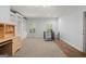 Second level bonus room featuring built-in bookshelves and desk, natural light and carpeted floors at 2058 Sewanee Ct, Villa Rica, GA 30180