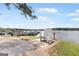 Scenic view of the lake marina, showcasing boats docked alongside a relaxing lakeside chair and view at 2058 Sewanee Ct, Villa Rica, GA 30180
