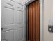 Interior view of residential elevator with safety gate, demonstrating an accessibility feature of the home at 2058 Sewanee Ct, Villa Rica, GA 30180