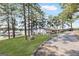 Charming lakeside marina with grassy lawn, dock, and views of the lake at 2058 Sewanee Ct, Villa Rica, GA 30180