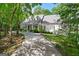 Charming home featuring a covered front porch, dormer windows, and a circular driveway at 2058 Sewanee Ct, Villa Rica, GA 30180