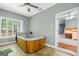 Spa room with a wooden hot tub and tile flooring, flooded with natural light at 2058 Sewanee Ct, Villa Rica, GA 30180