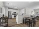Open concept kitchen with stainless steel appliances and wood grain flooring at 11255 Wittenridge Dr, Alpharetta, GA 30022