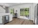 Kitchen area with stainless appliances and sliding doors to the backyard at 11255 Wittenridge Dr, Alpharetta, GA 30022
