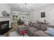 Inviting living and dining area with modern furnishings and an open layout, perfect for gatherings at 11255 Wittenridge Dr, Alpharetta, GA 30022