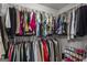Spacious walk-in closet featuring rods and shelves for optimal organization and storage of clothing and accessories at 11255 Wittenridge Dr, Alpharetta, GA 30022