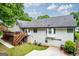 Spacious backyard featuring a large deck, walkout basement, two car garage and well-maintained lawn at 480 Holly Hills Ln, Mcdonough, GA 30252