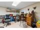 Basement workspace with desk, shelving, and office chair at 480 Holly Hills Ln, Mcdonough, GA 30252