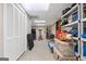 Finished basement with exercise equipment and storage shelves at 480 Holly Hills Ln, Mcdonough, GA 30252
