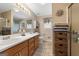 Bathroom featuring double sinks, a neutral color scheme, and ample storage at 480 Holly Hills Ln, Mcdonough, GA 30252