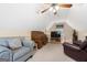 Bonus room with natural lighting, comfortable seating, and a roll-top desk at 480 Holly Hills Ln, Mcdonough, GA 30252