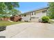 Exterior of the home showcasing the back deck, yard, and attached garage at 480 Holly Hills Ln, Mcdonough, GA 30252