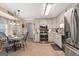 Bright eat-in kitchen features stainless steel appliances, white cabinets, and a cozy breakfast nook at 480 Holly Hills Ln, Mcdonough, GA 30252