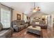 Bright living room featuring vaulted ceilings and comfortable seating arrangement at 480 Holly Hills Ln, Mcdonough, GA 30252