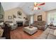 Spacious living room with vaulted ceiling, fireplace and plush seating area at 480 Holly Hills Ln, Mcdonough, GA 30252