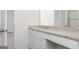 Bathroom features granite countertops, white cabinetry, and neutral color scheme at 279 Oliver Dr, Locust Grove, GA 30248