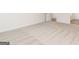 Spacious carpeted bedroom includes neutral walls, white trim, and white doors at 279 Oliver Dr, Locust Grove, GA 30248