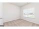 Bedroom with neutral walls, blinds, and carpet at 279 Oliver Dr, Locust Grove, GA 30248
