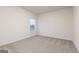 Spacious bedroom features neutral carpet and walls at 279 Oliver Dr, Locust Grove, GA 30248