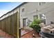 Backyard features a privacy fence and a small concrete patio at 547 Se Tufton Se Trl, Atlanta, GA 30354