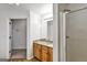 Bathroom features a vanity with granite countertop and a walk-in shower at 547 Se Tufton Se Trl, Atlanta, GA 30354