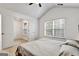 Bright bedroom with vaulted ceiling, window, and a closet with double doors at 547 Se Tufton Se Trl, Atlanta, GA 30354
