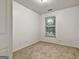 Bedroom with carpet, one window, and white walls at 547 Se Tufton Se Trl, Atlanta, GA 30354