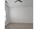 Bright bedroom featuring neutral carpet, ceiling fan, and natural light from a window at 547 Se Tufton Se Trl, Atlanta, GA 30354